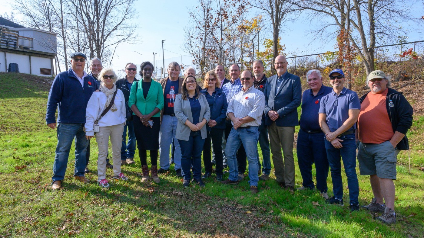 Representatives from various local organizations gathered for a group photo - representing the partners involved in the 12 mile creek restoration project