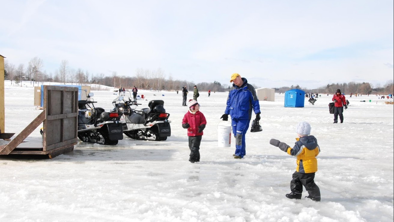 Adults and kids enjoy ice fishing at Binbrook