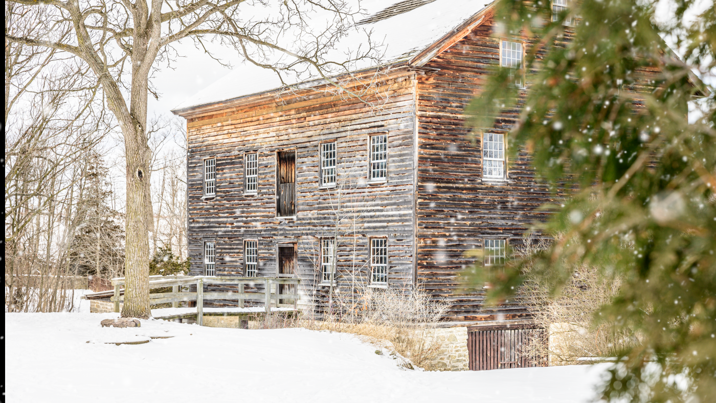 The Glen Elgin grist mill blanketed in snow.