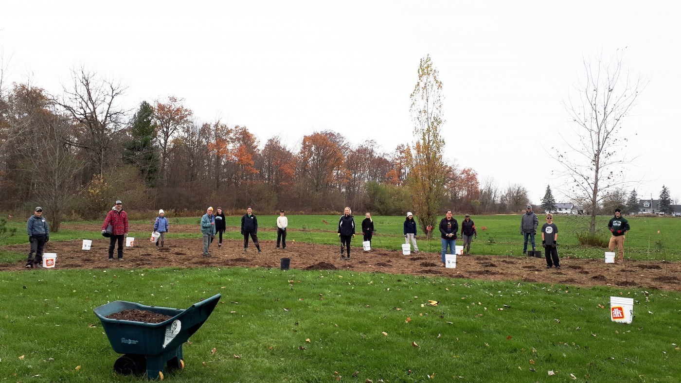 Volunteers gather at community planting