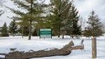 The entryway sign at Chippawa Creek in winter