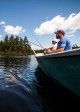 Two men fishing in lake